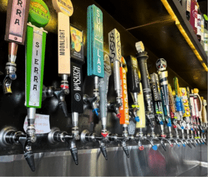 A Row of Beer Taps at a Bar